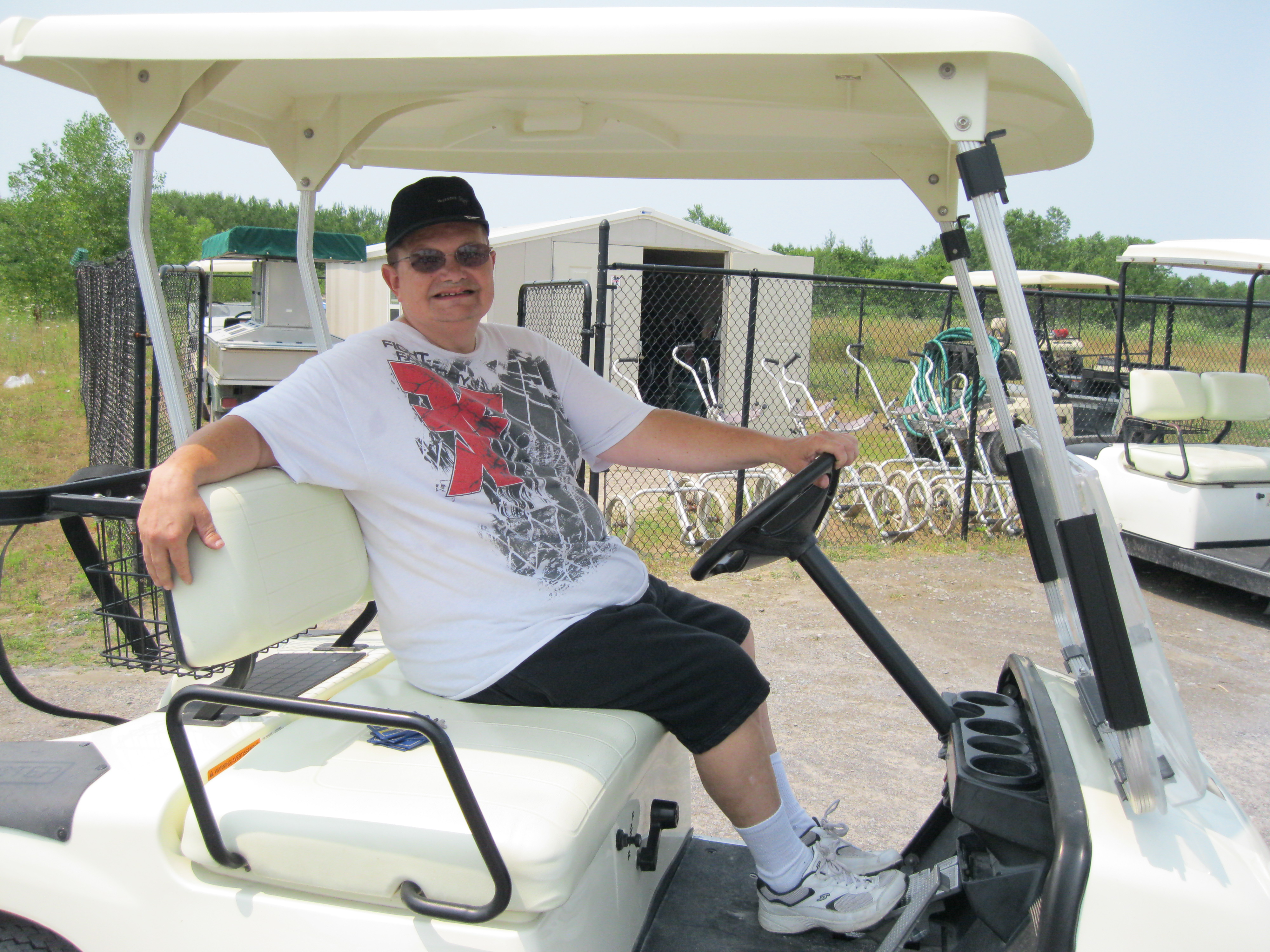 person in a golf cart